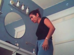 RelaXXX presents: Voyeur camera captures naked chick in bathroom