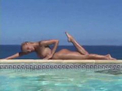 RelaXXX presents: Blonde strips from bikini and takes a dip