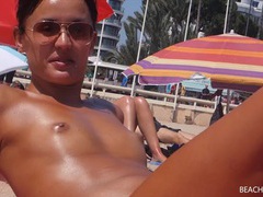 RelaXXX presents: Small tits girl with a great tan is topless at the beach